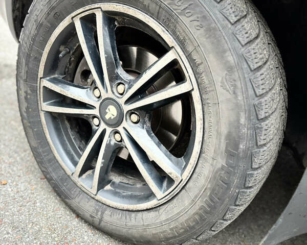 Черный Хендай Туксон, объемом двигателя 1.99 л и пробегом 266 тыс. км за 7500 $, фото 13 на Automoto.ua