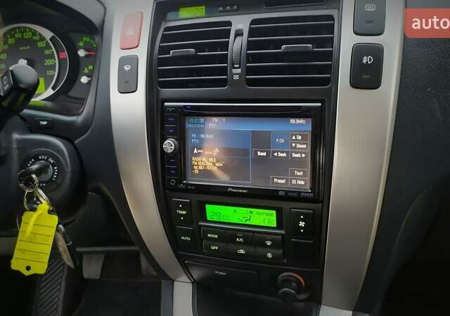 Чорний Хендай Туксон, об'ємом двигуна 2 л та пробігом 229 тис. км за 8600 $, фото 117 на Automoto.ua