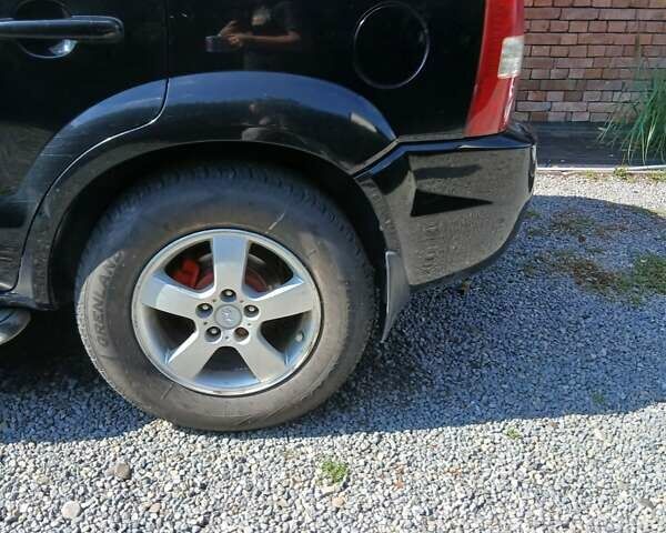 Черный Хендай Туксон, объемом двигателя 2 л и пробегом 15 тыс. км за 6200 $, фото 6 на Automoto.ua