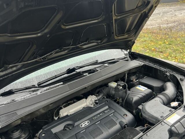 Хендай Туксон 2007 у Кам'янське (Дніпродзержинськ) на Automoto.ua Чорний Хендай Туксон, об'ємом двигуна 2 л та пробігом 162 тис. км за 7999 $, фото 16 на Automoto.ua