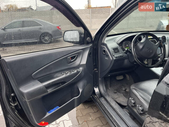Чорний Хендай Туксон, об'ємом двигуна 1.98 л та пробігом 177 тис. км за 8500 $, фото 4 на Automoto.ua