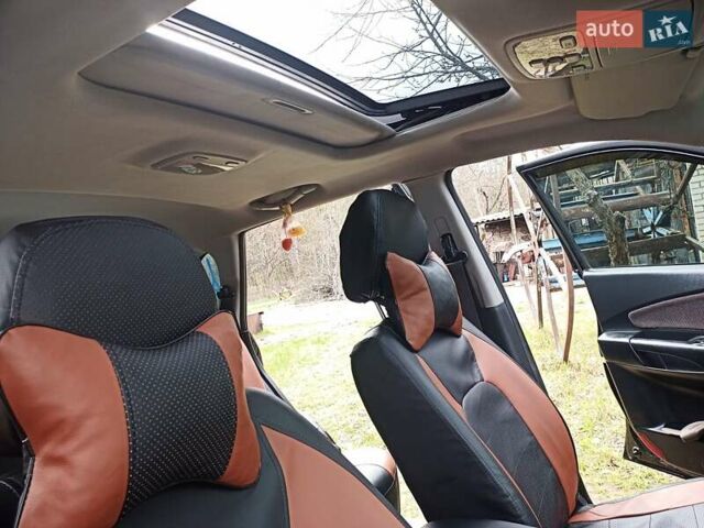 Черный Хендай Туксон, объемом двигателя 2 л и пробегом 240 тыс. км за 8200 $, фото 5 на Automoto.ua