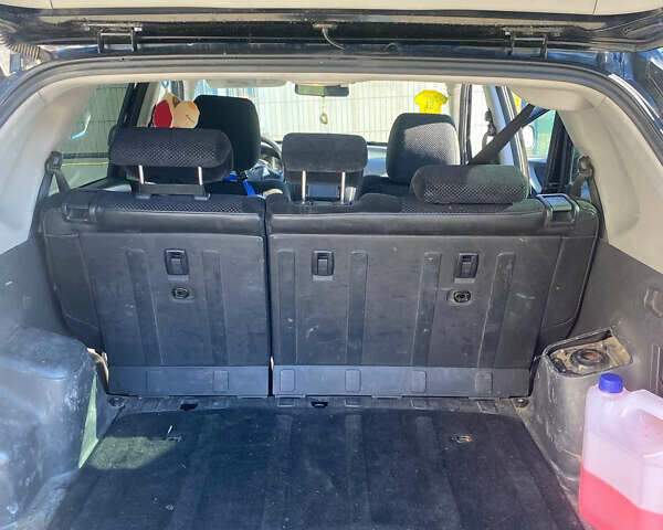 Чорний Хендай Туксон, об'ємом двигуна 1.98 л та пробігом 215 тис. км за 7540 $, фото 12 на Automoto.ua