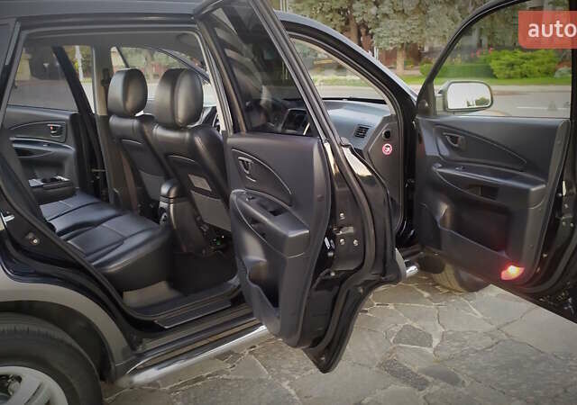 Черный Хендай Туксон, объемом двигателя 2 л и пробегом 230 тыс. км за 8600 $, фото 179 на Automoto.ua