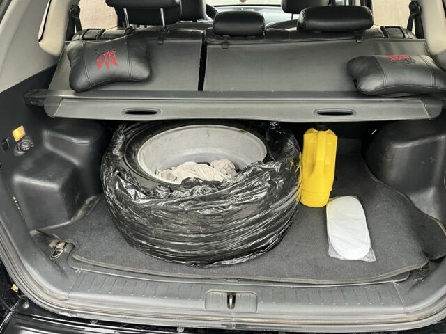 Черный Хендай Туксон, объемом двигателя 2 л и пробегом 177 тыс. км за 8500 $, фото 9 на Automoto.ua