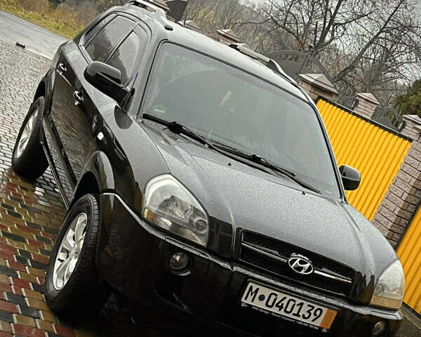 Черный Хендай Туксон, объемом двигателя 2 л и пробегом 151 тыс. км за 9100 $, фото 25 на Automoto.ua