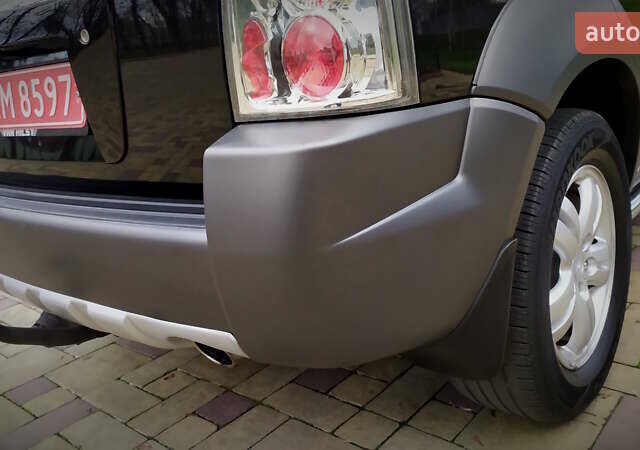 Чорний Хендай Туксон, об'ємом двигуна 2 л та пробігом 229 тис. км за 8600 $, фото 77 на Automoto.ua