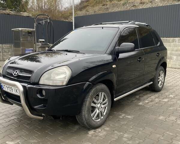 Чорний Хендай Туксон, об'ємом двигуна 1.99 л та пробігом 345 тис. км за 7600 $, фото 6 на Automoto.ua