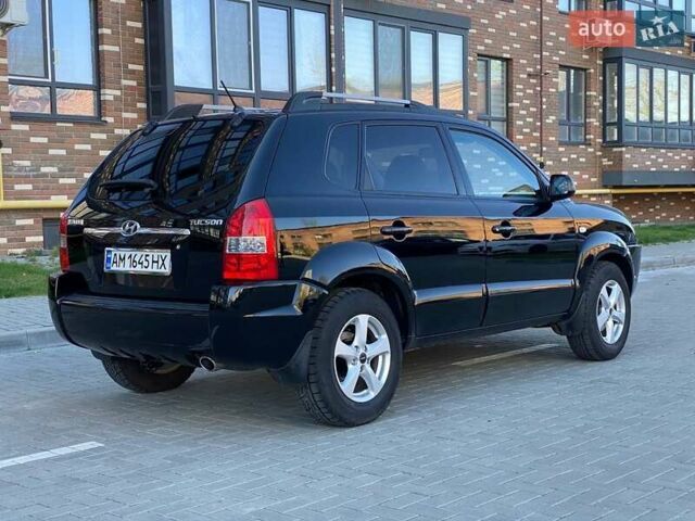 Черный Хендай Туксон, объемом двигателя 1.98 л и пробегом 286 тыс. км за 7300 $, фото 8 на Automoto.ua