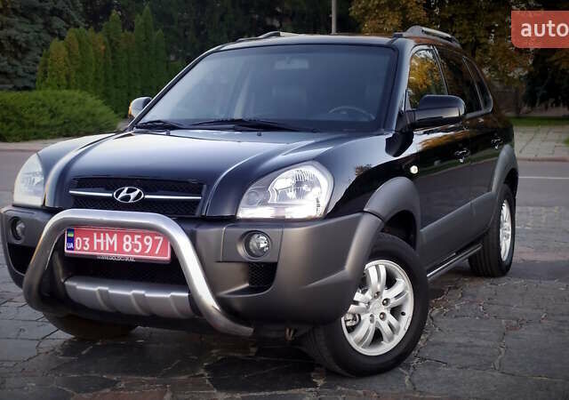 Черный Хендай Туксон, объемом двигателя 2 л и пробегом 230 тыс. км за 8600 $, фото 86 на Automoto.ua