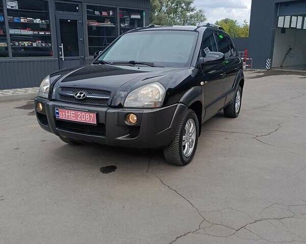 Черный Хендай Туксон, объемом двигателя 2 л и пробегом 255 тыс. км за 8400 $, фото 8 на Automoto.ua