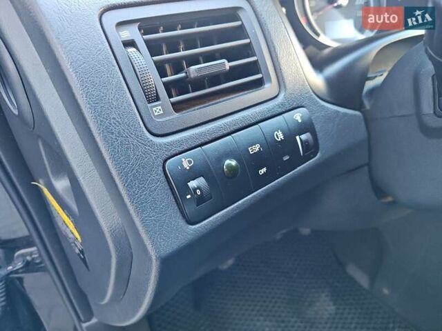 Черный Хендай Туксон, объемом двигателя 1.98 л и пробегом 286 тыс. км за 7300 $, фото 34 на Automoto.ua