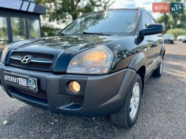 Черный Хендай Туксон, объемом двигателя 2 л и пробегом 227 тыс. км за 8200 $, фото 31 на Automoto.ua