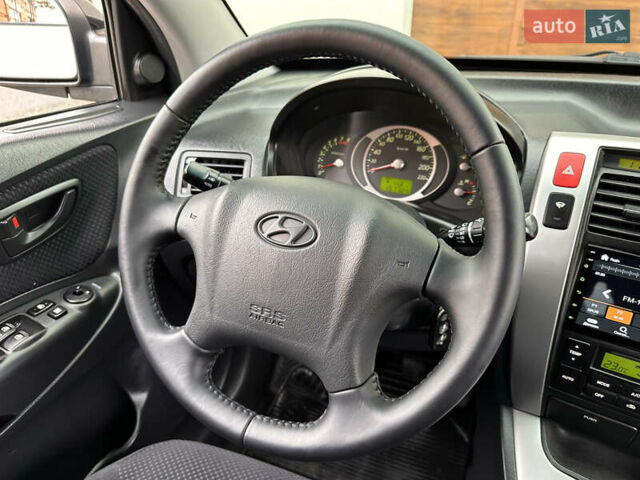 Хендай Туксон 2007 в Ужгороде на Automoto.ua Черный Хендай Туксон, объемом двигателя 1.98 л и пробегом 157 тыс. км за 7300 $, фото 31 на Automoto.ua