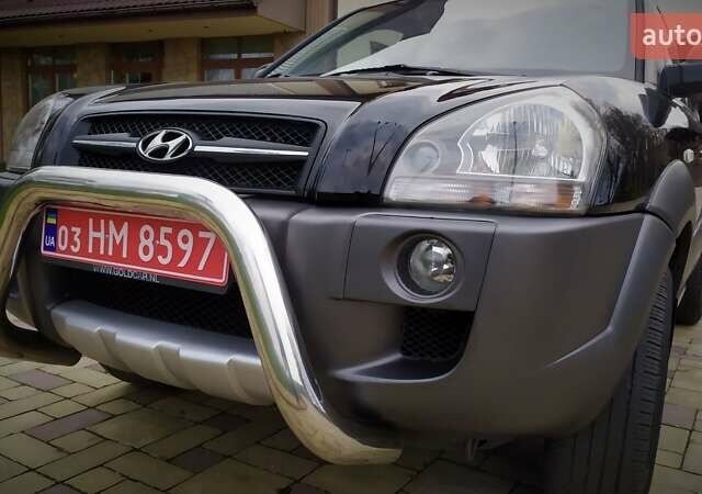 Чорний Хендай Туксон, об'ємом двигуна 2 л та пробігом 229 тис. км за 8600 $, фото 58 на Automoto.ua