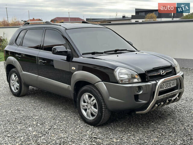 Хендай Туксон 2007 в Ужгороде на Automoto.ua Черный Хендай Туксон, объемом двигателя 1.98 л и пробегом 157 тыс. км за 7300 $, фото 12 на Automoto.ua