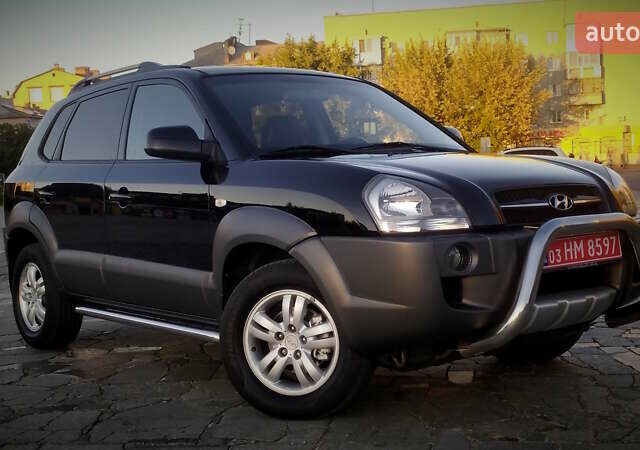 Черный Хендай Туксон, объемом двигателя 2 л и пробегом 230 тыс. км за 8600 $, фото 29 на Automoto.ua