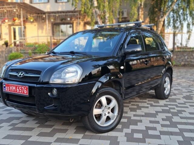Чорний Хендай Туксон, об'ємом двигуна 2 л та пробігом 190 тис. км за 8300 $, фото 11 на Automoto.ua