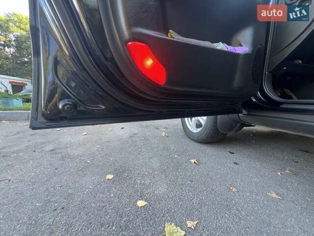 Чорний Хендай Туксон, об'ємом двигуна 1.98 л та пробігом 207 тис. км за 8500 $, фото 16 на Automoto.ua