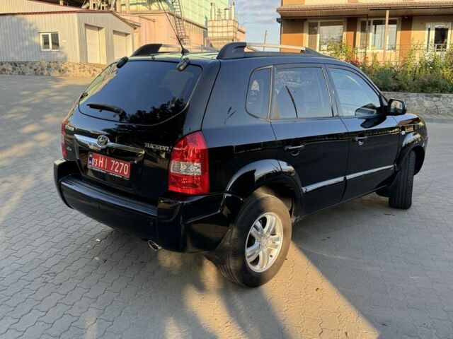 Черный Хендай Туксон, объемом двигателя 2 л и пробегом 180 тыс. км за 7800 $, фото 5 на Automoto.ua