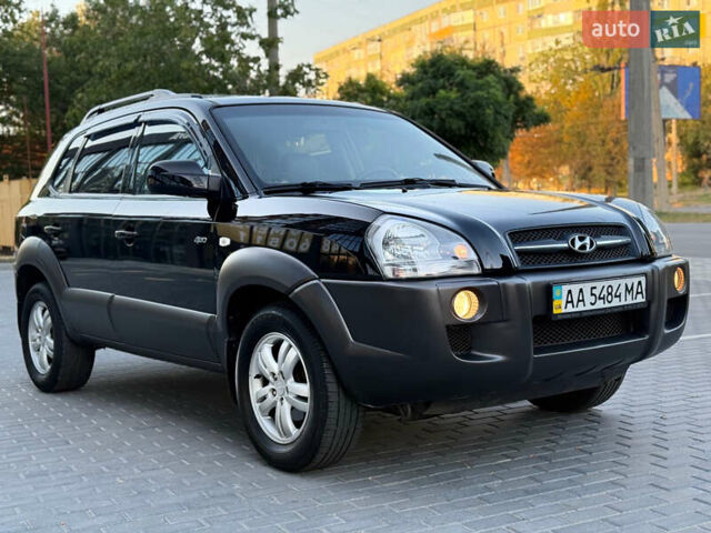 Чорний Хендай Туксон, об'ємом двигуна 1.98 л та пробігом 205 тис. км за 7700 $, фото 6 на Automoto.ua