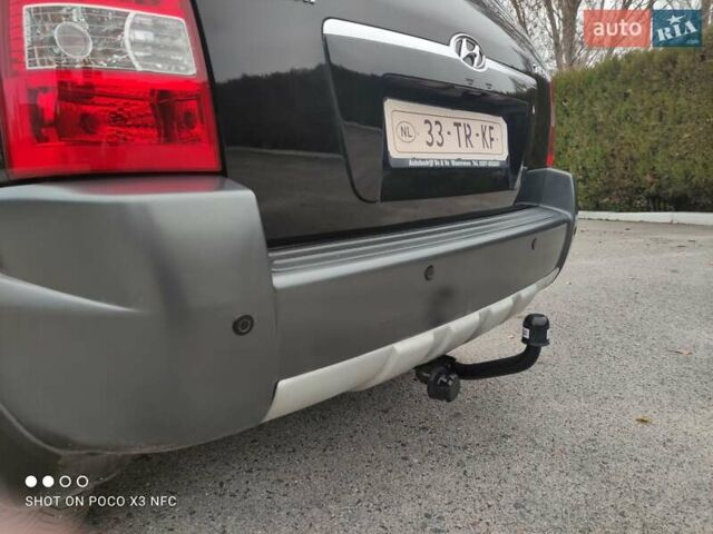 Черный Хендай Туксон, объемом двигателя 1.98 л и пробегом 182 тыс. км за 8150 $, фото 53 на Automoto.ua