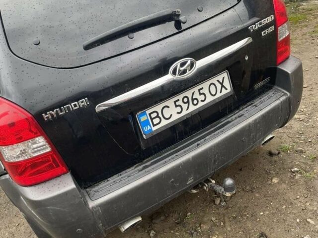 Чорний Хендай Туксон, об'ємом двигуна 2 л та пробігом 230 тис. км за 5999 $, фото 5 на Automoto.ua