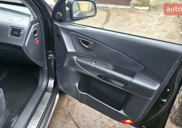 Чорний Хендай Туксон, об'ємом двигуна 2 л та пробігом 207 тис. км за 8200 $, фото 16 на Automoto.ua