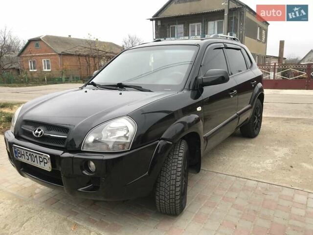 Черный Хендай Туксон, объемом двигателя 2 л и пробегом 210 тыс. км за 8999 $, фото 31 на Automoto.ua