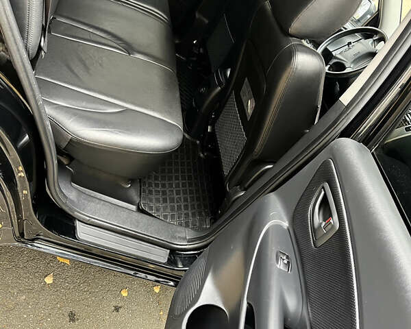 Черный Хендай Туксон, объемом двигателя 1.98 л и пробегом 99 тыс. км за 8999 $, фото 12 на Automoto.ua