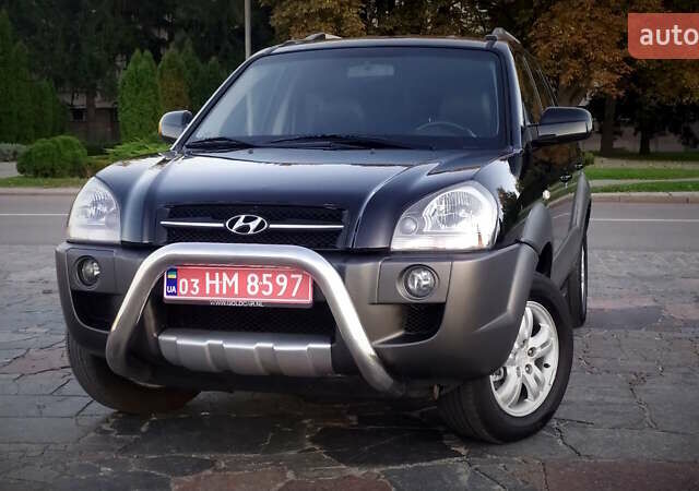 Черный Хендай Туксон, объемом двигателя 2 л и пробегом 230 тыс. км за 8600 $, фото 90 на Automoto.ua
