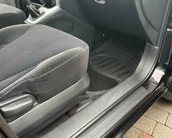 Черный Хендай Туксон, объемом двигателя 2 л и пробегом 218 тыс. км за 7600 $, фото 17 на Automoto.ua