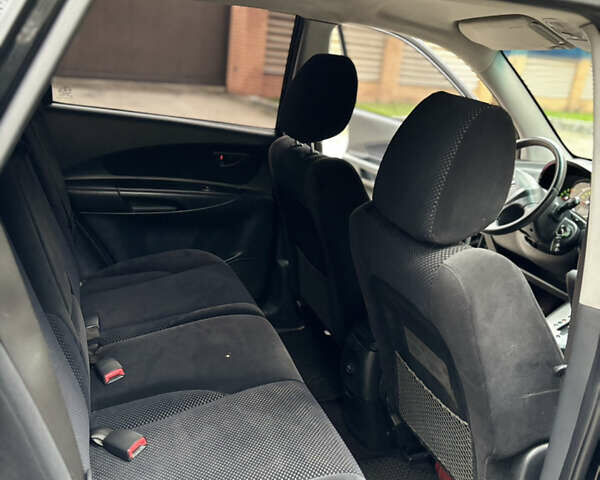 Черный Хендай Туксон, объемом двигателя 1.99 л и пробегом 266 тыс. км за 7500 $, фото 25 на Automoto.ua