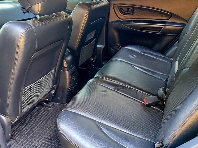 Черный Хендай Туксон, объемом двигателя 2 л и пробегом 270 тыс. км за 7800 $, фото 8 на Automoto.ua