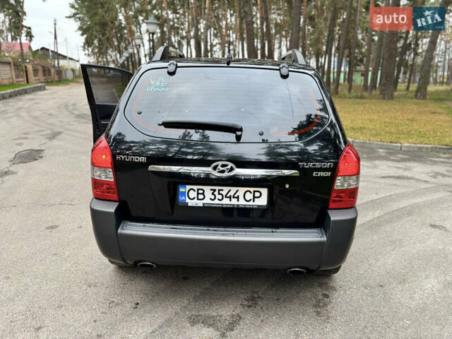 Черный Хендай Туксон, объемом двигателя 1.99 л и пробегом 266 тыс. км за 7500 $, фото 20 на Automoto.ua