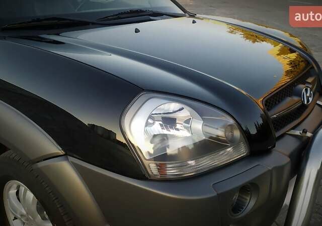 Черный Хендай Туксон, объемом двигателя 2 л и пробегом 230 тыс. км за 8600 $, фото 50 на Automoto.ua