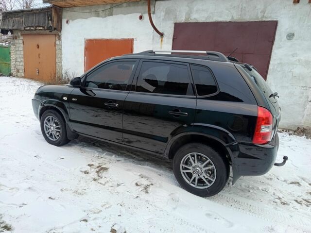 Черный Хендай Туксон, объемом двигателя 2 л и пробегом 260 тыс. км за 7900 $, фото 8 на Automoto.ua