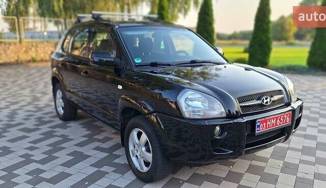 Черный Хендай Туксон, объемом двигателя 2 л и пробегом 190 тыс. км за 8150 $, фото 5 на Automoto.ua