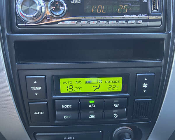 Черный Хендай Туксон, объемом двигателя 1.98 л и пробегом 197 тыс. км за 8000 $, фото 37 на Automoto.ua