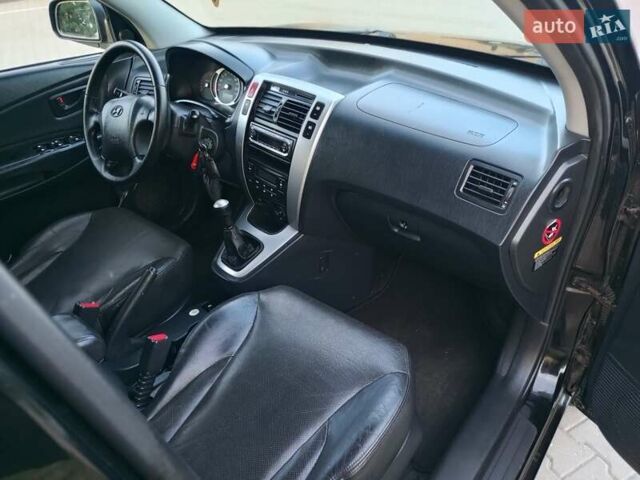 Чорний Хендай Туксон, об'ємом двигуна 1.98 л та пробігом 192 тис. км за 7950 $, фото 36 на Automoto.ua