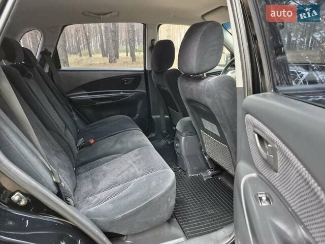 Черный Хендай Туксон, объемом двигателя 2 л и пробегом 198 тыс. км за 7800 $, фото 12 на Automoto.ua