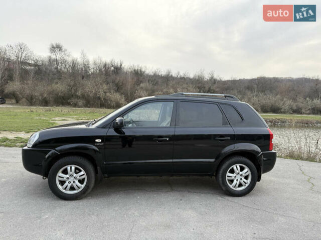 Черный Хендай Туксон, объемом двигателя 1.98 л и пробегом 159 тыс. км за 7600 $, фото 42 на Automoto.ua