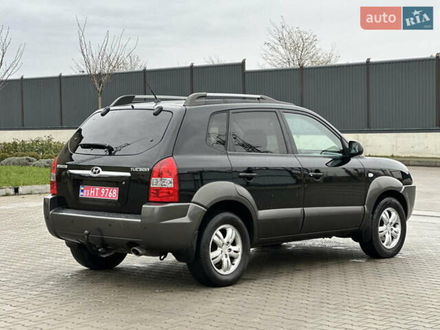 Чорний Хендай Туксон, об'ємом двигуна 2 л та пробігом 230 тис. км за 6850 $, фото 8 на Automoto.ua