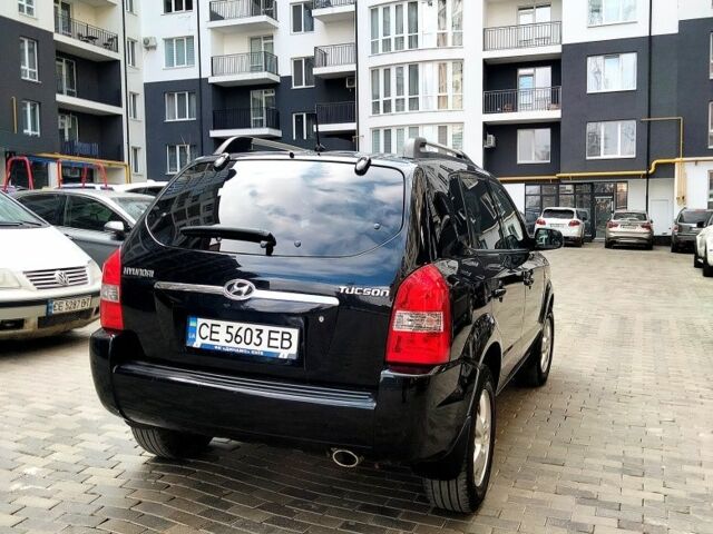 Чорний Хендай Туксон, об'ємом двигуна 2 л та пробігом 190 тис. км за 7500 $, фото 2 на Automoto.ua