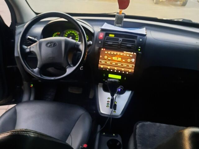 Черный Хендай Туксон, объемом двигателя 2 л и пробегом 1 тыс. км за 8500 $, фото 1 на Automoto.ua