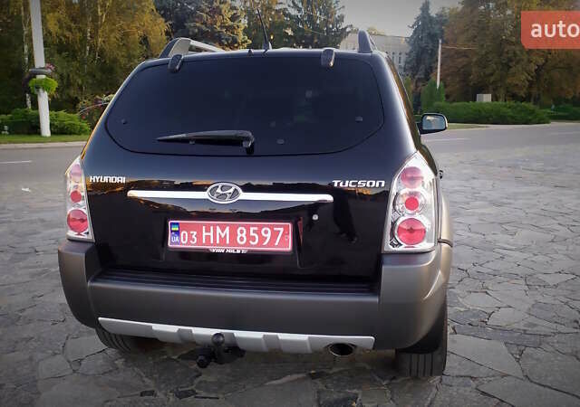 Черный Хендай Туксон, объемом двигателя 2 л и пробегом 230 тыс. км за 8600 $, фото 42 на Automoto.ua
