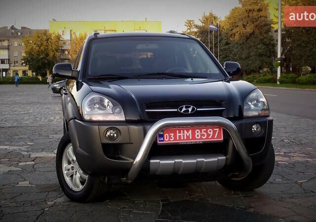 Черный Хендай Туксон, объемом двигателя 2 л и пробегом 230 тыс. км за 8600 $, фото 117 на Automoto.ua