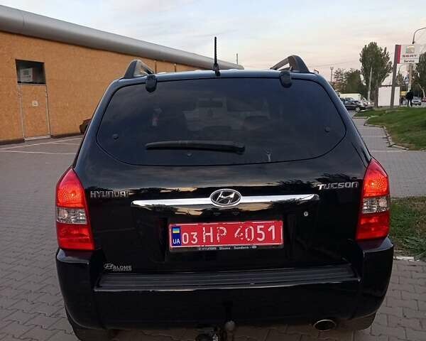 Чорний Хендай Туксон, об'ємом двигуна 1.98 л та пробігом 192 тис. км за 7950 $, фото 3 на Automoto.ua