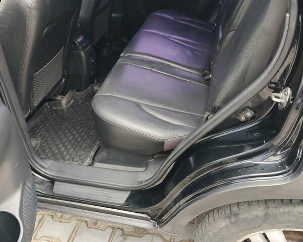 Черный Хендай Туксон, объемом двигателя 2.7 л и пробегом 280 тыс. км за 7200 $, фото 3 на Automoto.ua