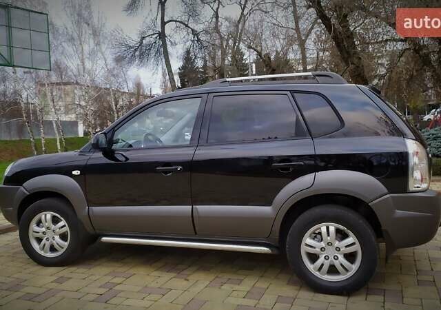 Чорний Хендай Туксон, об'ємом двигуна 2 л та пробігом 229 тис. км за 8600 $, фото 52 на Automoto.ua